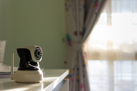 The CCTV security camera operating in home.