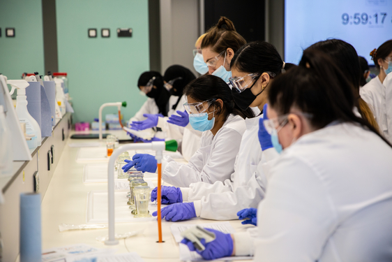 A diverse group of students in the biology lab.