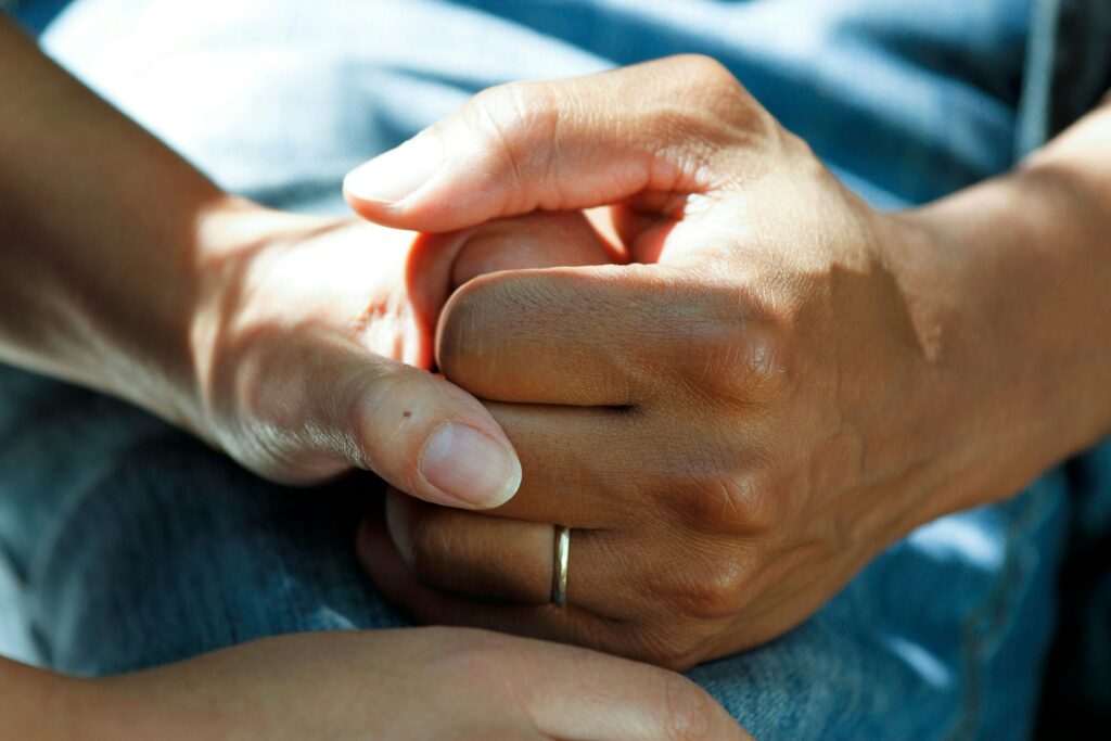 clasped-hands-in-hospital